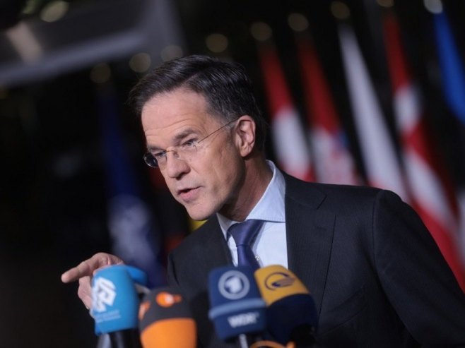 Марк Руте (фото: EPA/OLIVIER HOSLET) - 