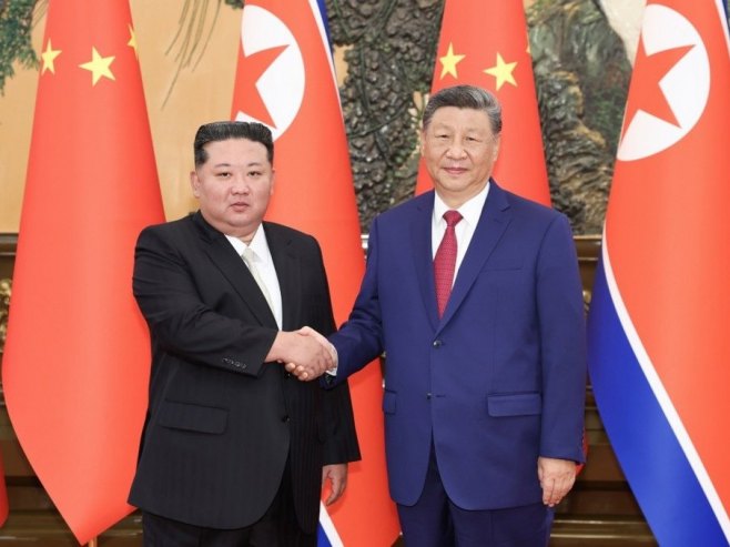 Сусрет Ким Џонг Уна и Си Ђинпинга, архива (Фото: EPA/XINHUA) - 